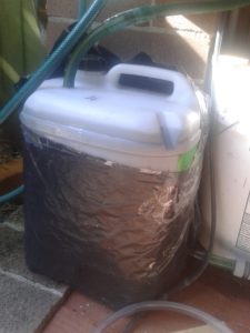 Our second cheap Biofilter, sitting above a timber clad IBC tank.
