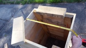 Cut the pieces from the last step, and measure across your compost bin in the other direction. Add some to this measurment so your lid will overhang a bit. I added 20mm to my measurement (10mm each side). Cut two slats to this length, using the widest ones you have