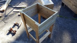 Add more timber to deepen the oven box. Don't make it too deep, you'll get less direct light reaching the bottom.