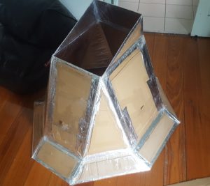 Make sure the array is taped on both sides of every join. Also tape along the top and bottom edges, so the foil won't get damaged if you bump it into something. Make sure ever you has tape that reaches from cardboard to cardboard - totally bridging over the foil, or it may tear.
